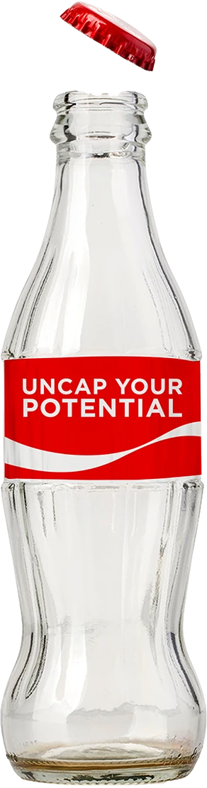 Coca-Cola bottle with an Uncap your potential label and its cap popping off