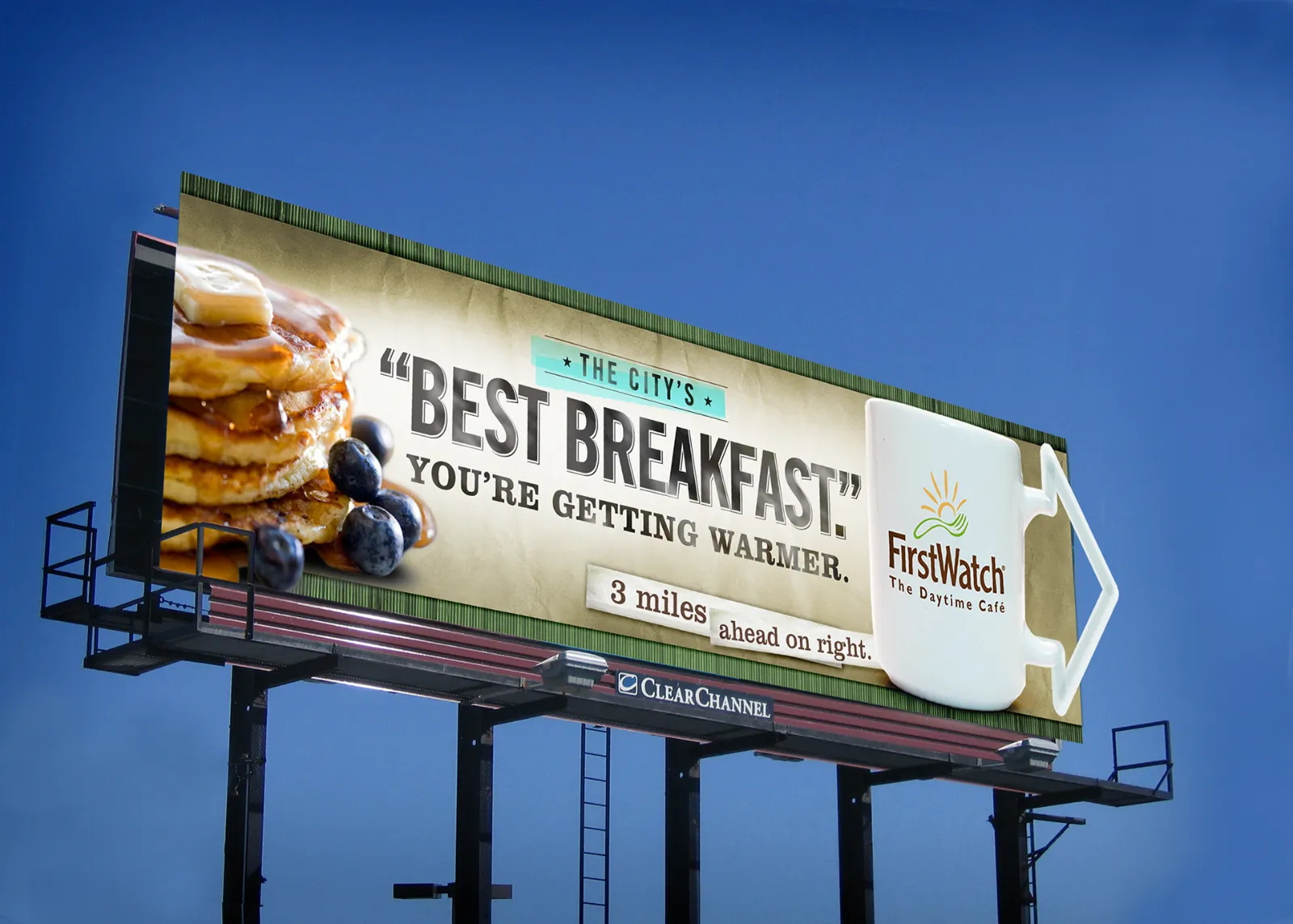 First Watch billboard reading The City's Best Breakfast, You're getting warmer, 3 miles ahead on right