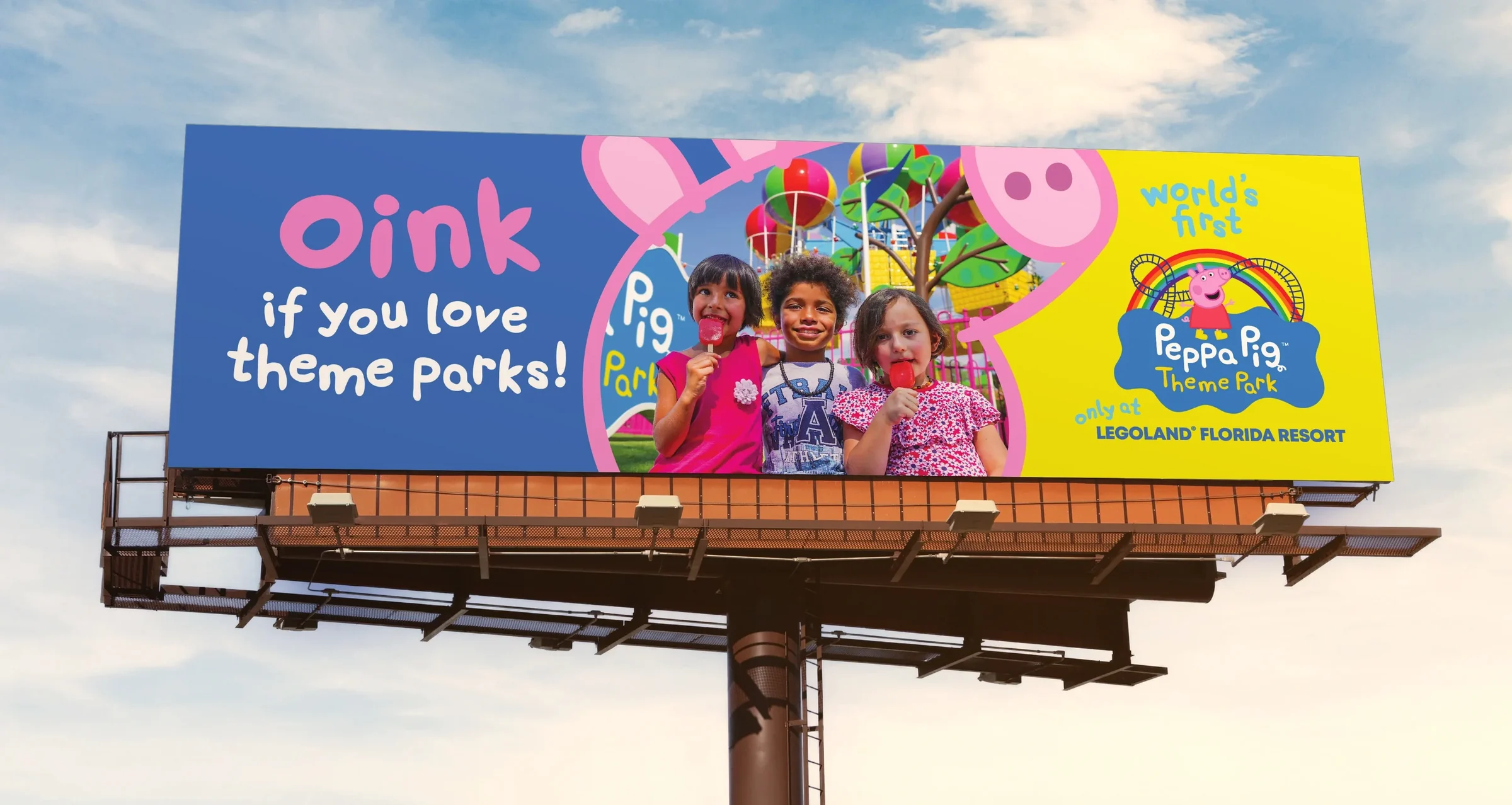 Billboard reading Oink if you love theme parks, with three kids holding lollipops inside a Peppa Pig head shape