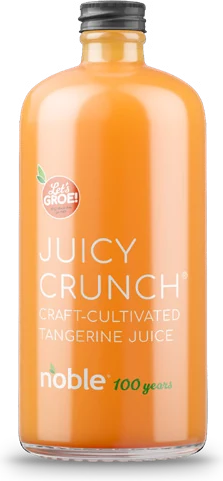 Limited-edition Juicy Crunch craft-cultivated tangerine juice bottle with the Let’s Groe! badge and Noble 100 years